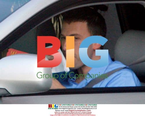 Ben Affleck Eats Cheeseburger At Airport