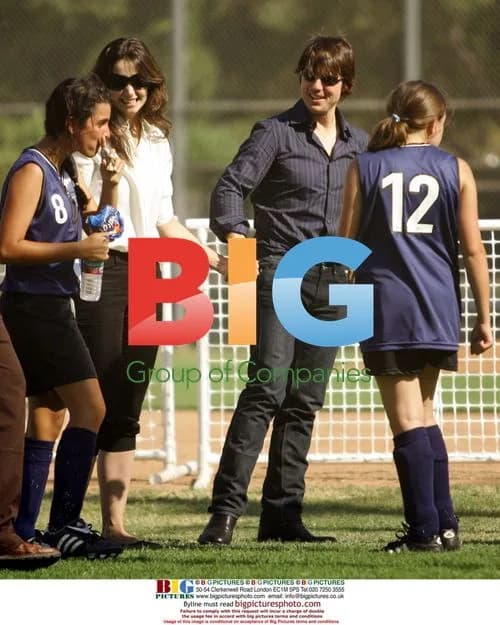 Tom Cruise and Katie Holmes Watching Daughter