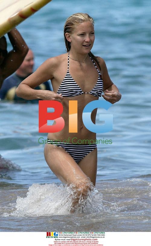 Kate Hudson Surfs in Hawaii