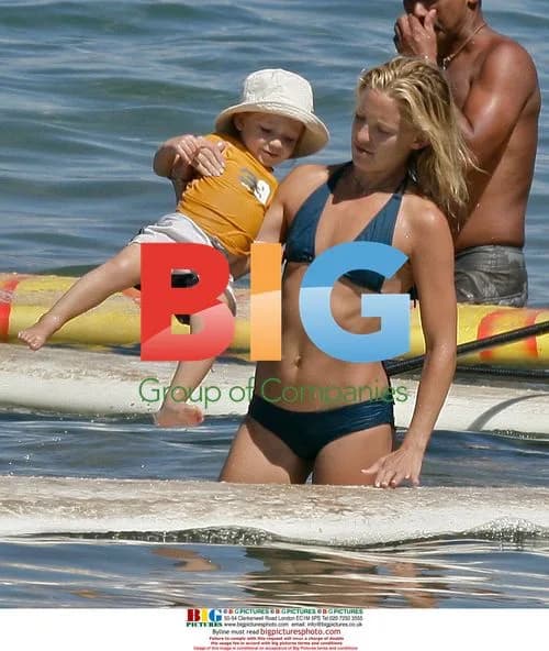 Kate Hudson Gives Son Surf Lesson