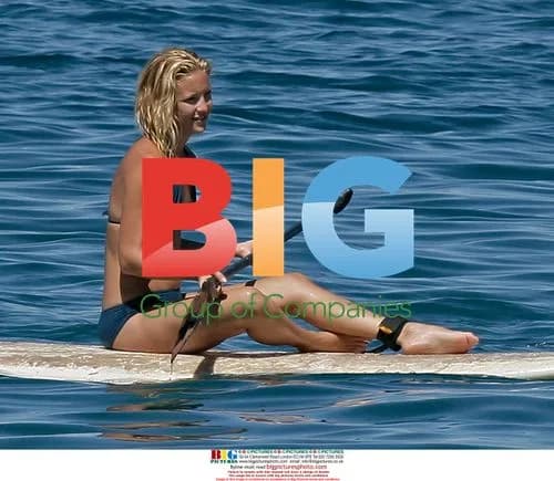 Kate Hudson and son surf in Maui