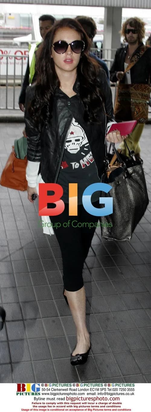 Linsey Lohan departs London Heathrow