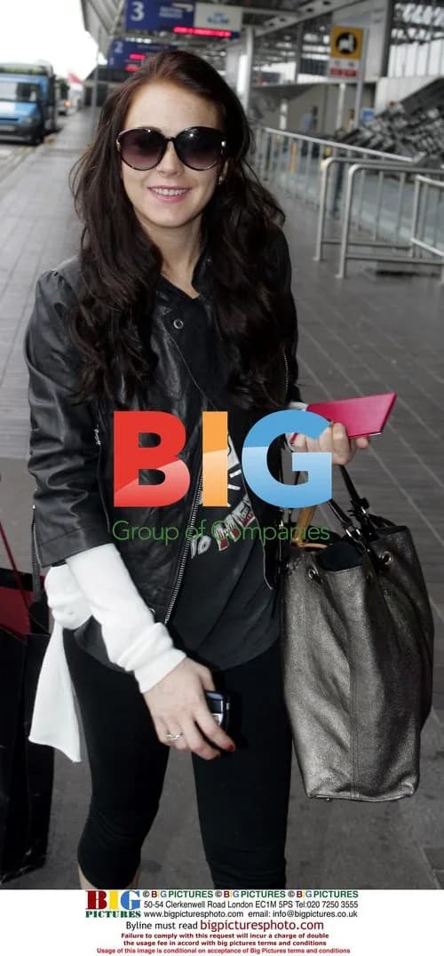 Linsey Lohan departs Heathrow