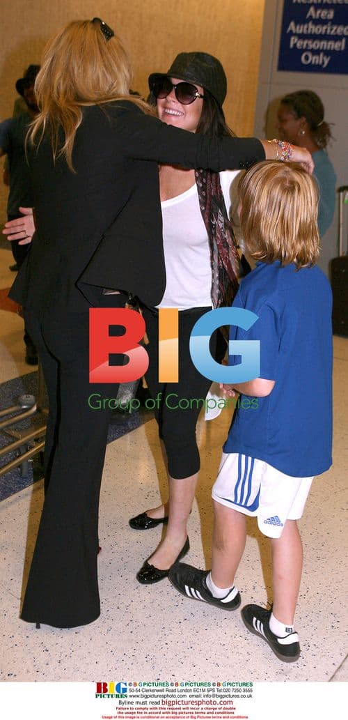 Lindsay Lohan Arrives at JFK Airport