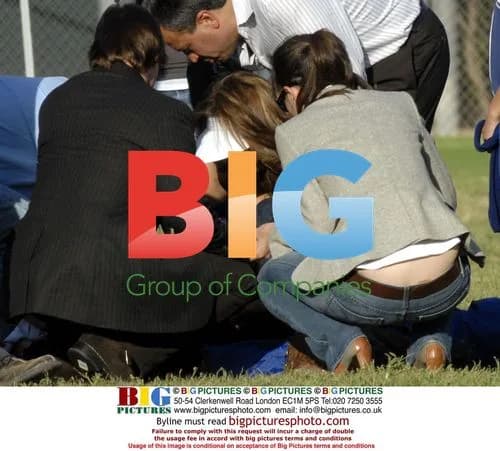 Tom Cruise and Katie Holmes watch daughter at soccer game