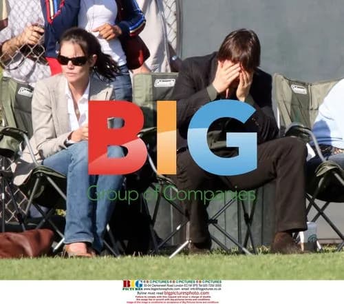 Tom Cruise and Katie Holmes Watch Daughter's Football Match