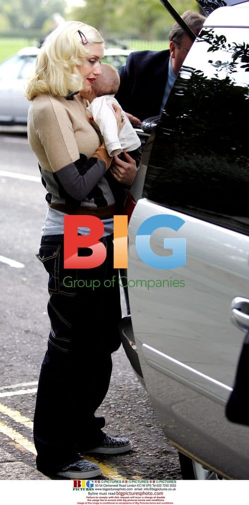 Gwen Stefani Leaves Home with Son