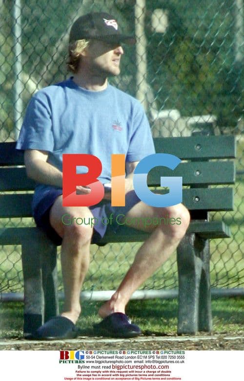 Owen Wilson out with his dog