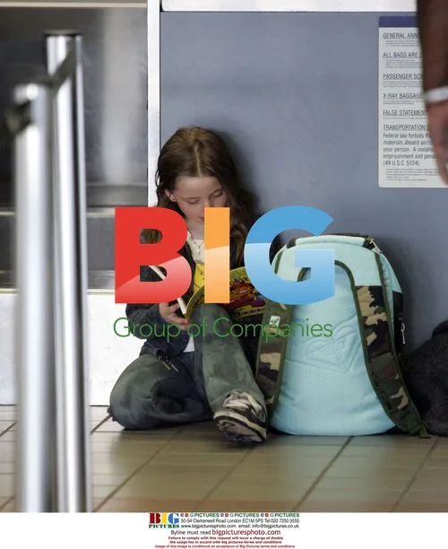 Kate Beckinsale Departs LAX with Daughter Lily