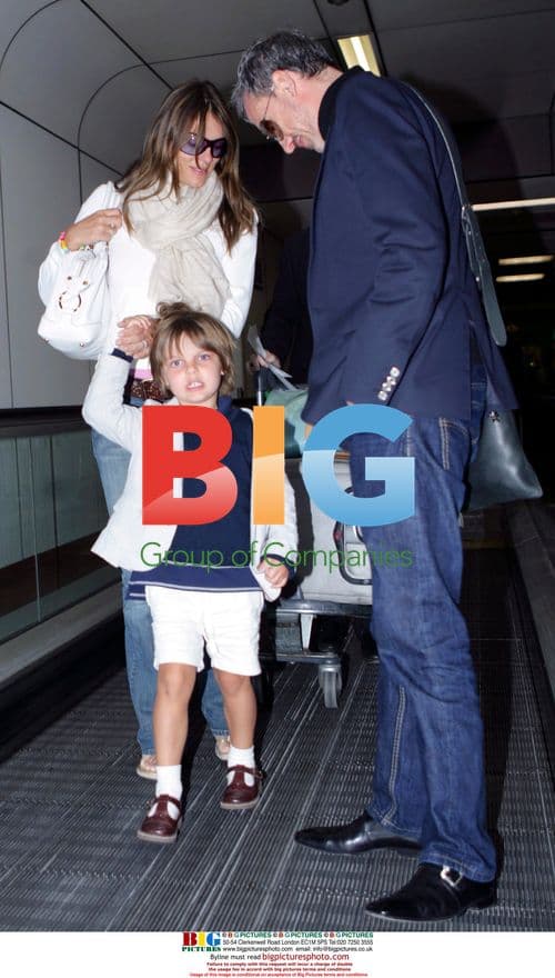 Liz Hurley Arriving at Heathrow with Son