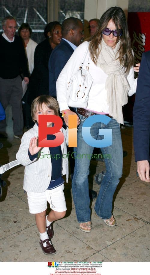 Liz Hurley and son at Heathrow