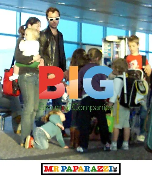Jude Law takes budget flight