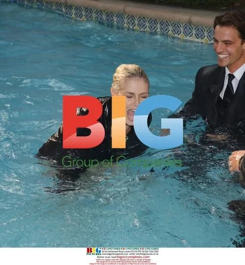 Heidi Klum Pushed into Pool at Jewelry Collection Launch