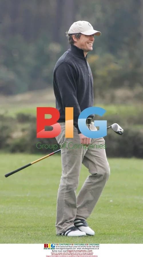 Hugh Grant playing golf at Sunningdale