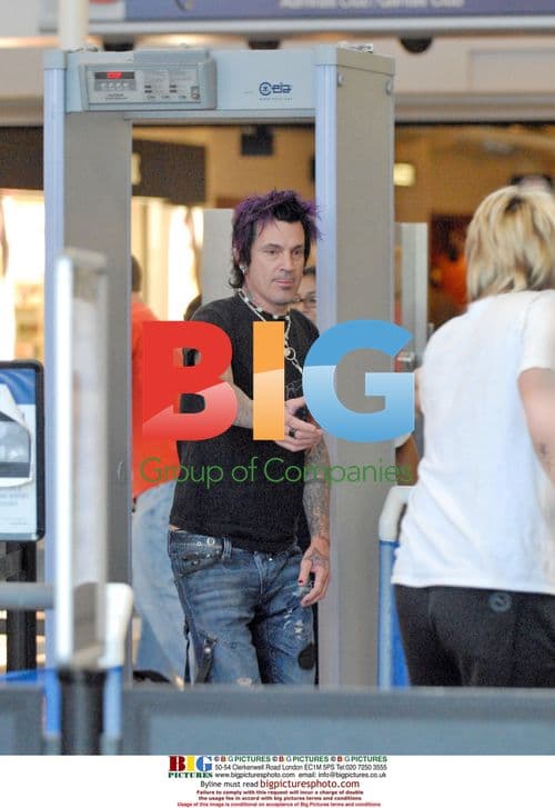 Tommy Lee and Pamela Anderson at LAX