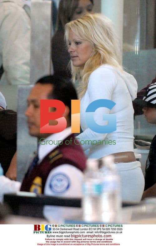 Tommy Lee and Pamela Anderson at LAX