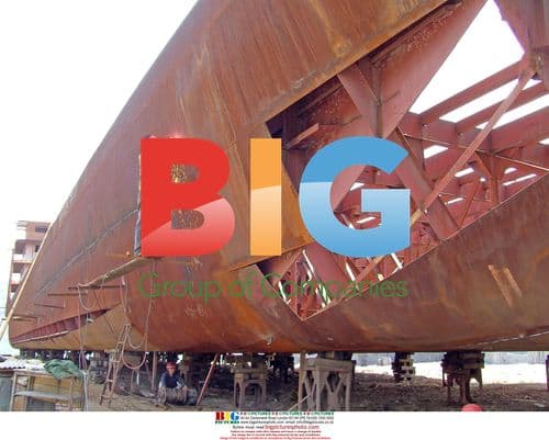 Workers building cargo ships in China