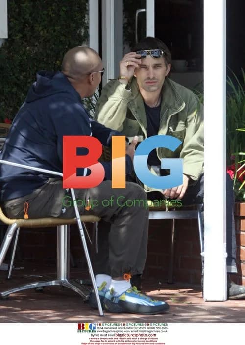 Olivier Martinez chats with friend at Fred Segal