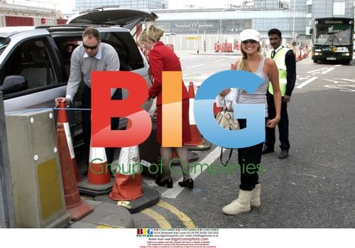 Nadine Coyle Arrives at Heathrow Airport