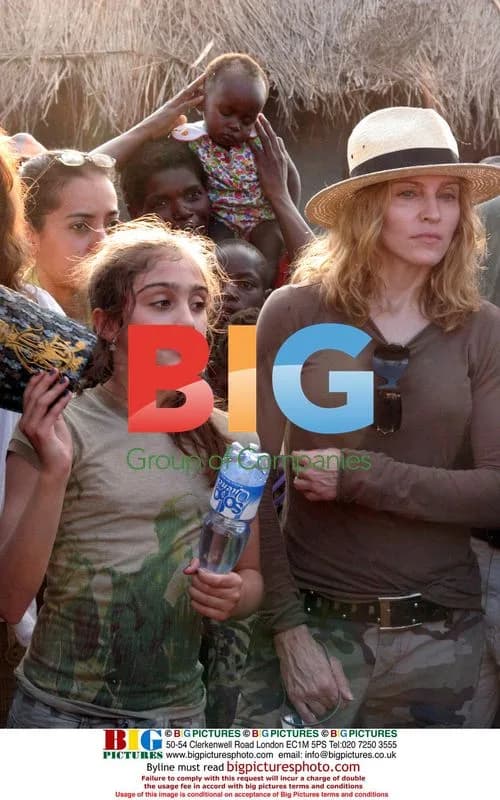 Madonna tours corn fields in Malawi with daughter