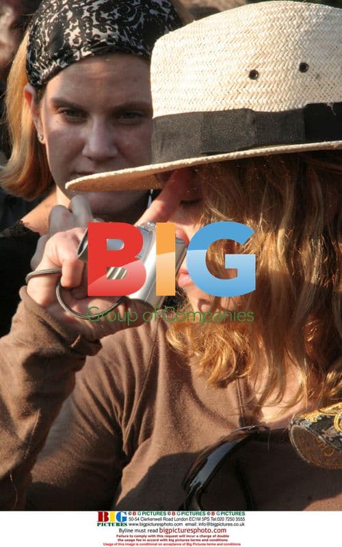 Madonna tours Malawi corn fields with daughter