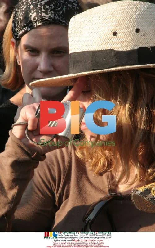 Madonna tours Malawi corn fields with daughter