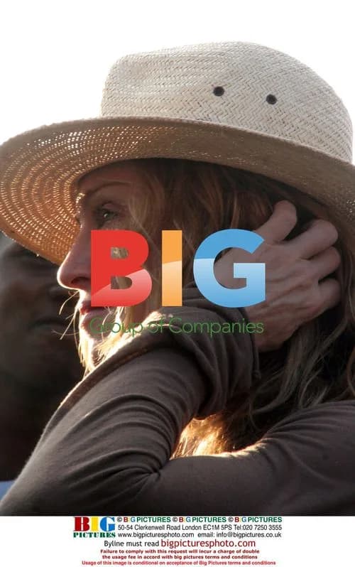 Madonna tours corn fields in Malawi