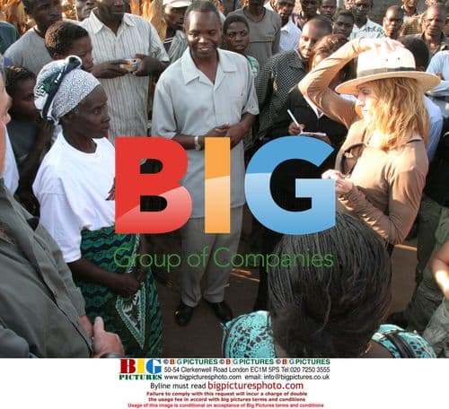 Madonna tours corn fields in Malawi