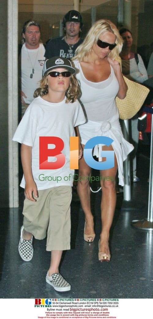 Pamela Anderson and Family Arrive at LAX