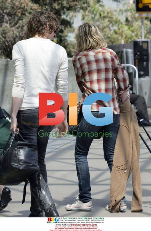 Kirsten Dunst arrives at LAX with Johnny Borrell