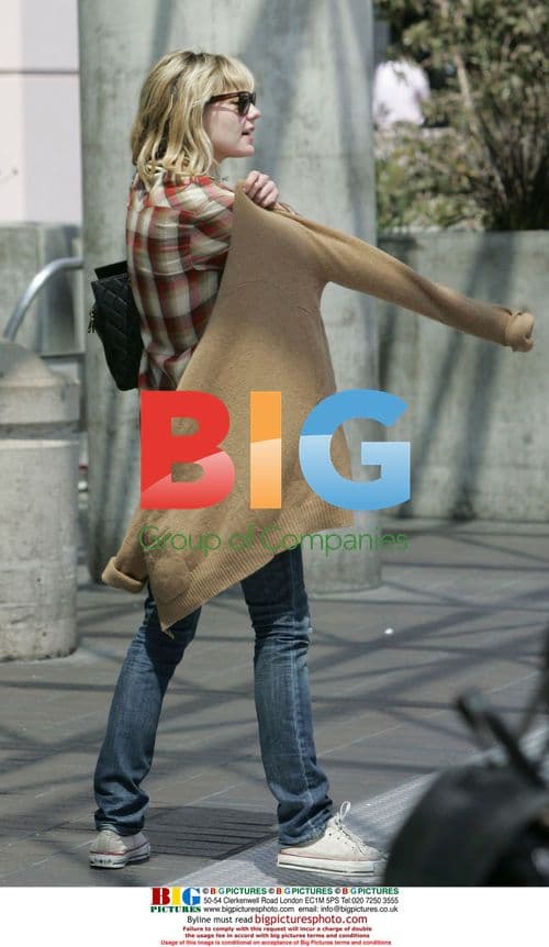 Kirsten Dunst arrives at LAX for Japan photo shoot