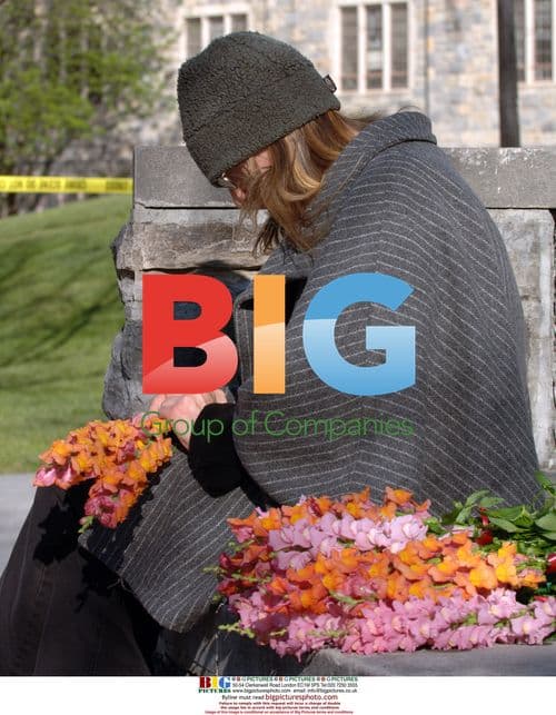 Deborah Wiley-Vawter brings flowers to Norris Hall