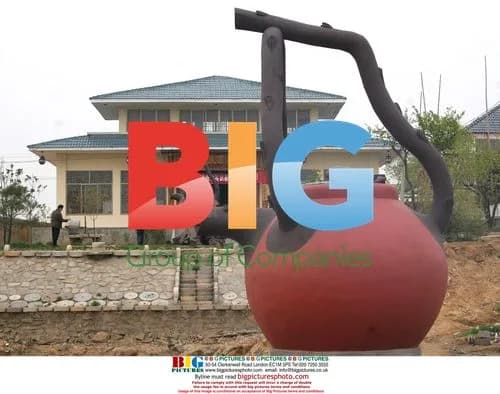 Huge Red Clay Teapot Showcased in Xu Fu Tea Shop