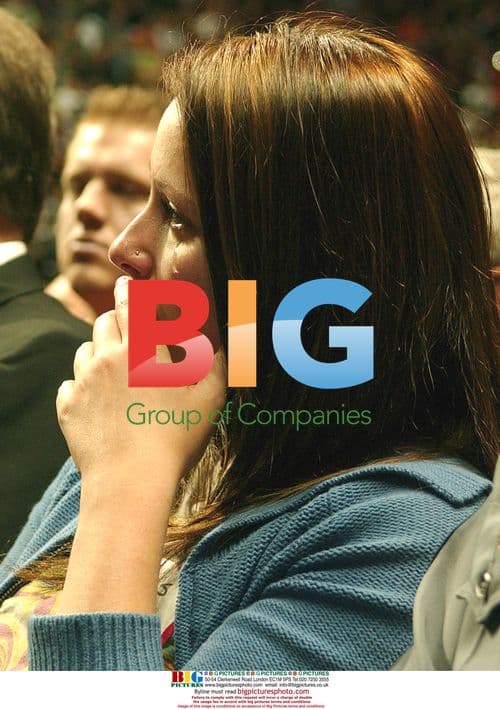 Woman cries during Virginia Tech memorial