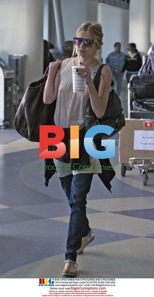 Sienna Miller Arrives at LAX with New Beau