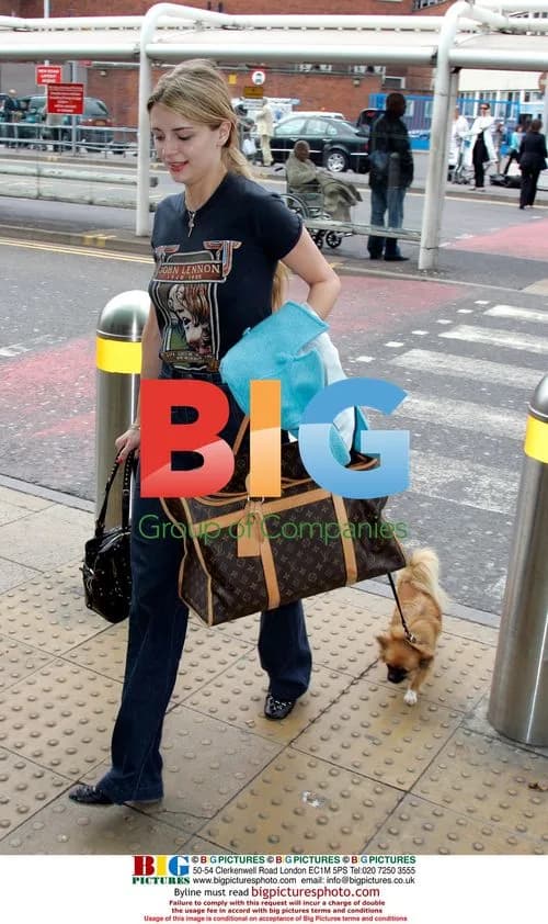 Mischa Barton Leaves Hotel with Pup