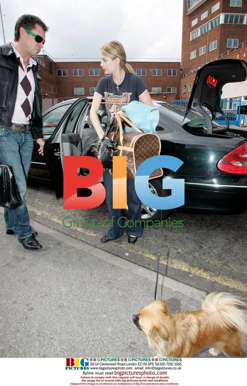 Mischa Barton Departs London Hotel With Pet
