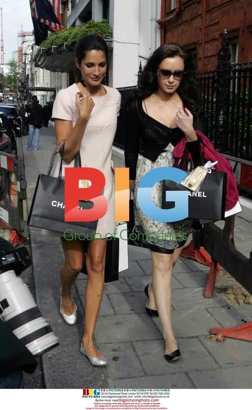 Camilla Al Fayed and Friend Walk Past Claridges Hotel