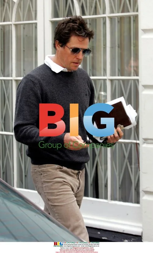 Hugh Grant Leaves Home After Photographer Incident