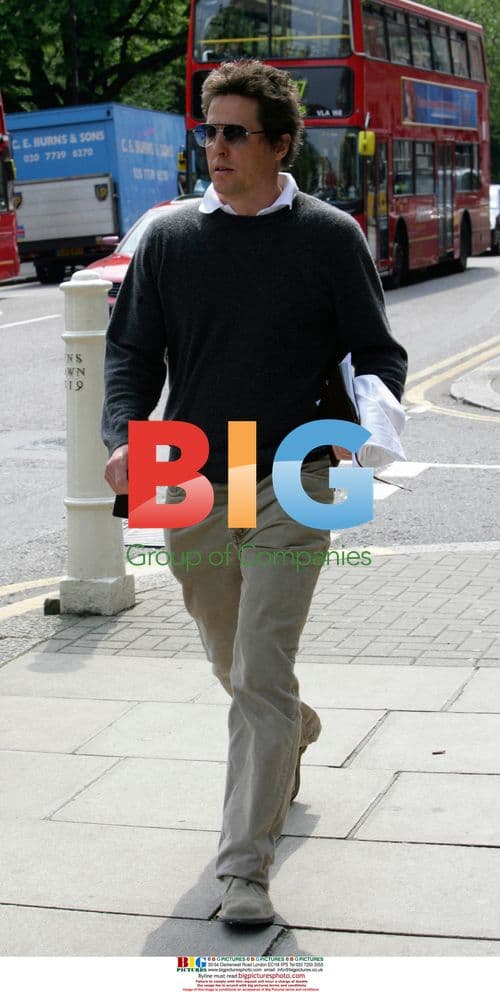 Hugh Grant leaving home after photographer incident