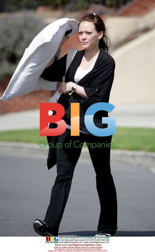 Hilary Duff Holds Large Pillow in LA