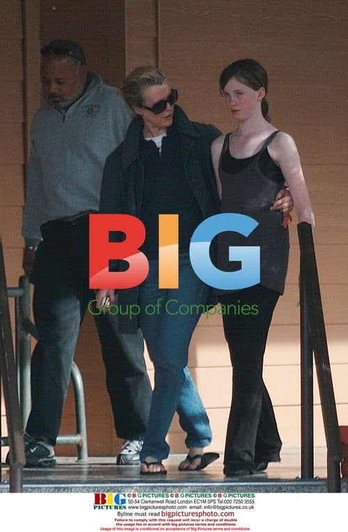 Kim Basinger and daughter out with bodyguard