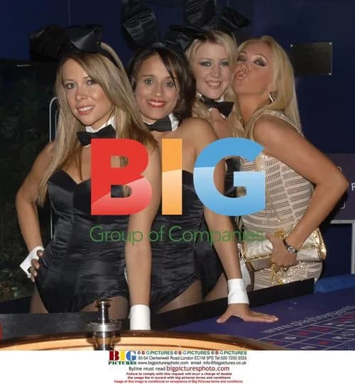 Footballers and Guests Pose with Playboy Bunnies