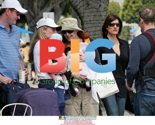 Marcia Cross and husband shop with twins