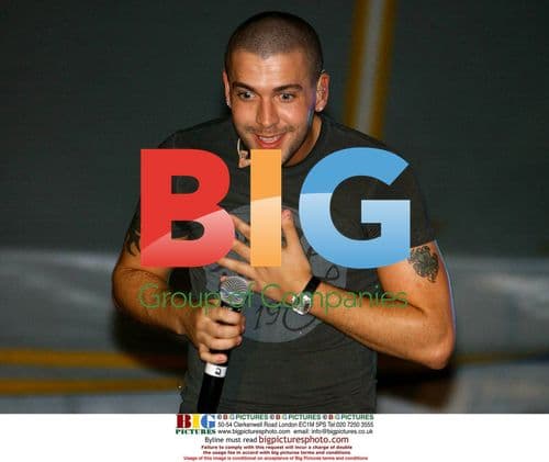 Shayne Ward Exposes Tattoos at Spring Fair