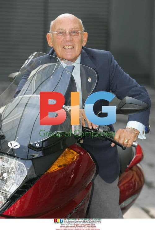 Suzy Perry and Sir Stirling Moss at Vectrix scooter launch