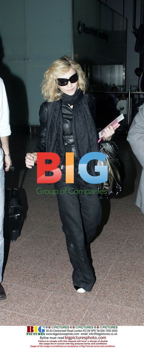 Madonna Arrives at London Heathrow