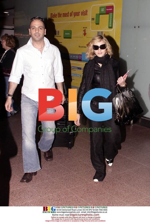 Madonna Arrives at London Heathrow