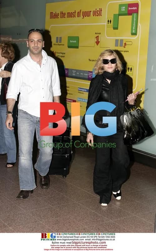 Madonna Arrives at Heathrow