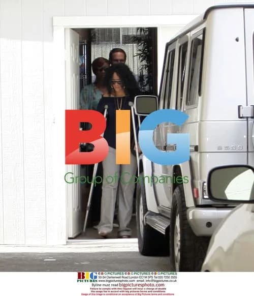 Rihanna leaves Melrose Hair Salon in crutches